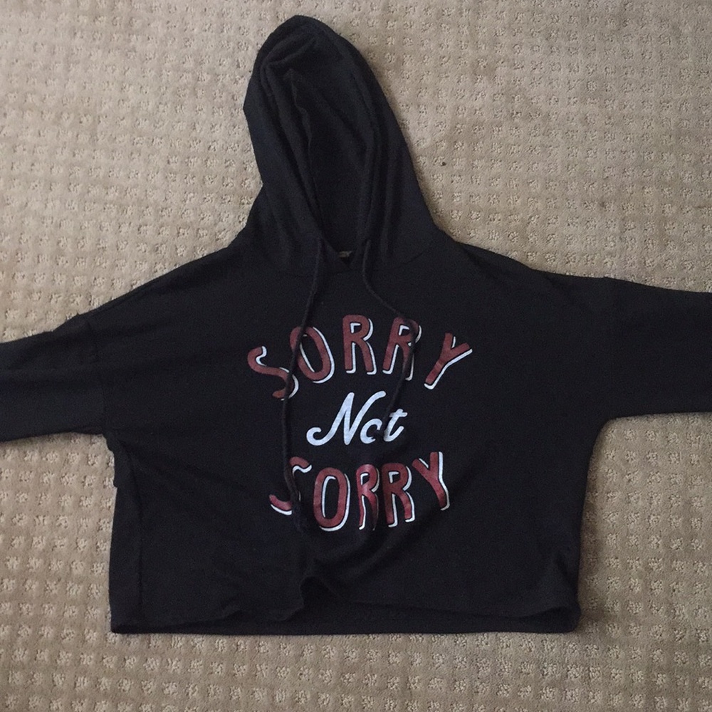 “Sorry not sorry” long sleeve crop top